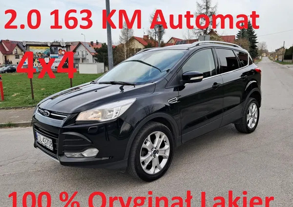 małopolskie Ford Kuga cena 51700 przebieg: 158000, rok produkcji 2014 z Wolbrom